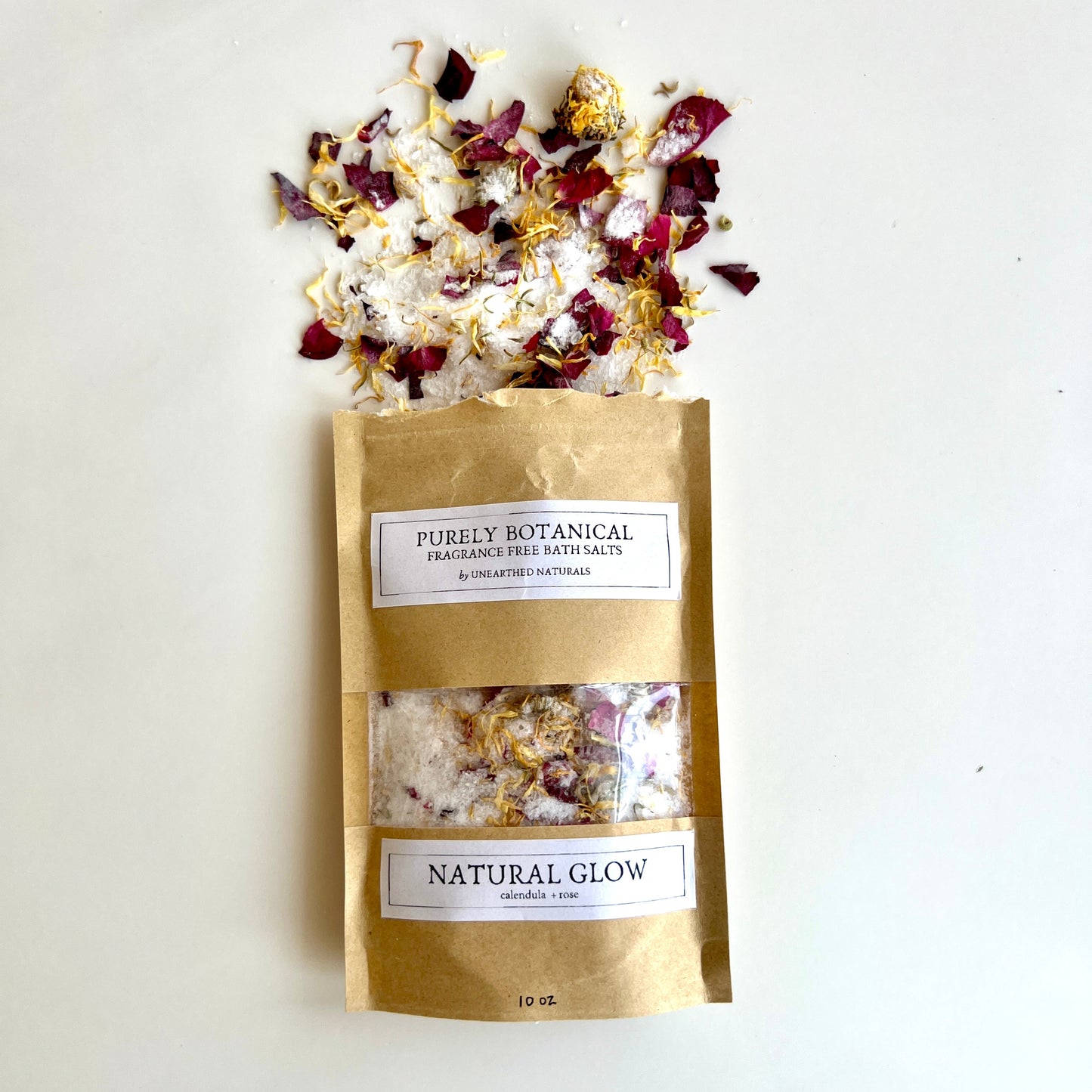 Natural Glow Fragrance-Free Bath Salt by Unearthed Naturals, made with calendula and rose petals for a soothing, skin-nourishing soak