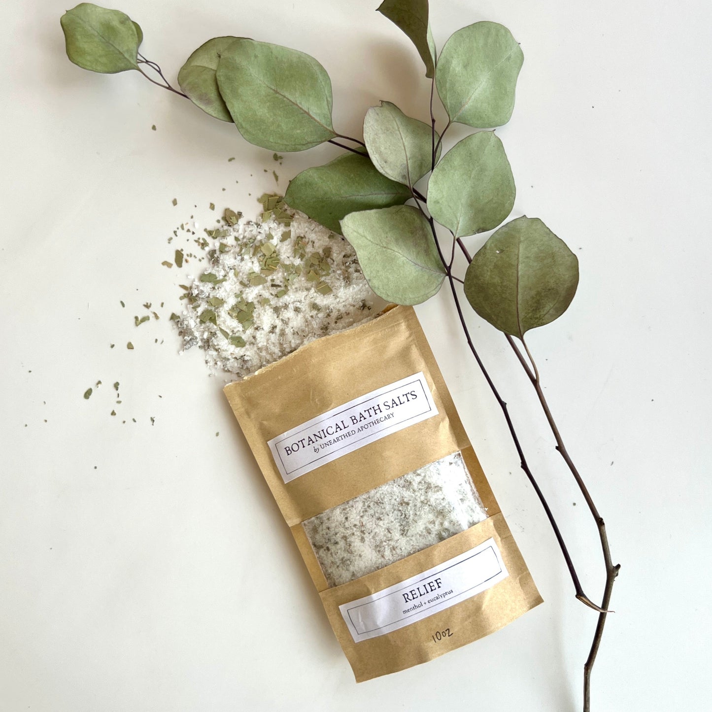 Unearthed Naturals’ Relief Bath Salt, crafted with all-natural eucalyptus and menthol for a therapeutic bath that soothes and refreshes