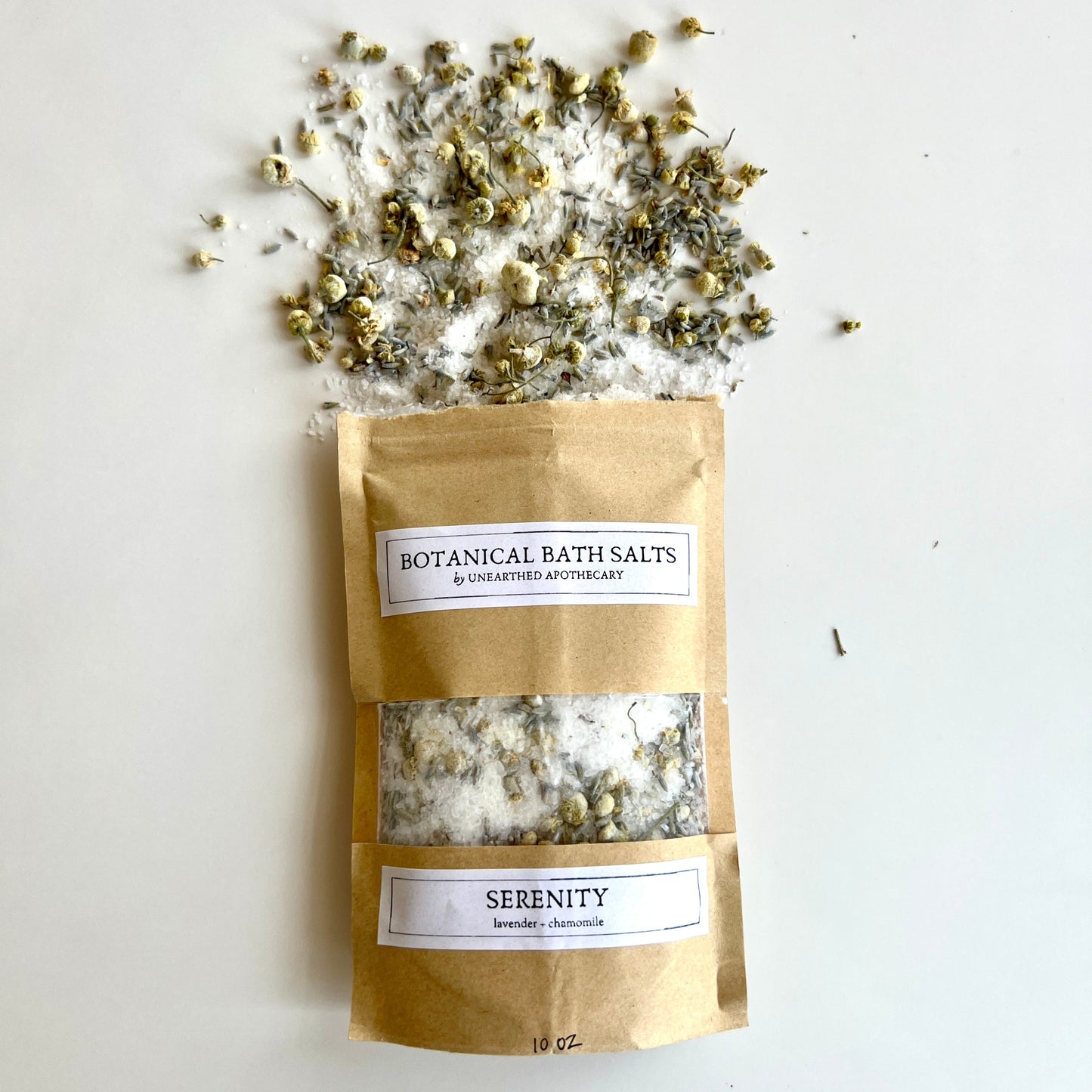 Serenity Bath Salts by Unearthed Naturals, infused with calming lavender and chamomile to promote relaxation and stress relief.