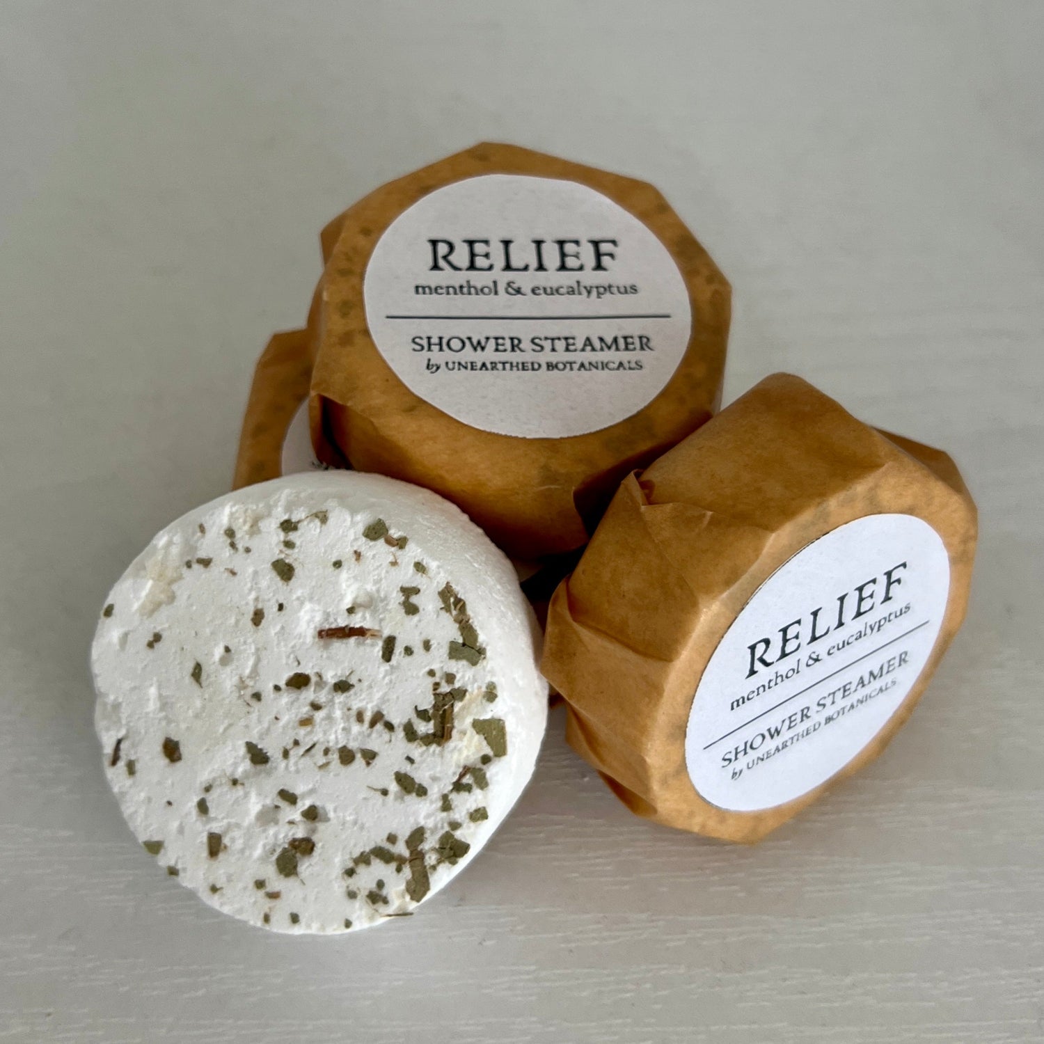 A set of Relief Shower Steamers infused with eucalyptus and menthol crystals, perfect for congestion relief and an invigorating shower experience.